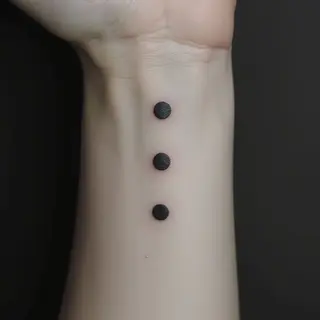 Decoding the 3 Dots Tattoo: Meaning, Placement & Design Ideas