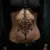 Gothic Arabic Calligraphy Ribcage Tattoos: Tiny & Powerful