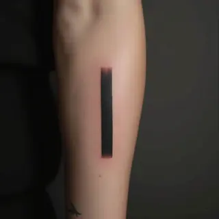 Decoding the Meaning of Black Stripe Arm Tattoos