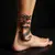 Japanese Dragon Tattoo Meaning & Micro-Realism Ankle Design