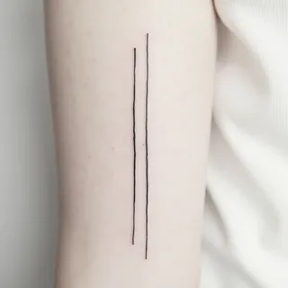 The Quiet Resonance of Double Line Tattoos