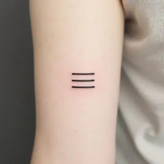 The Meaning Behind an Equal Sign Tattoo: Balance, Harmony & More
