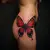 Subtle Best Friend Tattoos for Women: Abstract Black & Red Designs