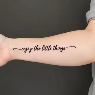 Enjoy the Little Things: A Delicate Script Tattoo