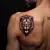 Roaring Geometric Lion Finger Tattoos: Bold Orange Designs