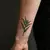 Minimalist Tiger Lily Wrist Tattoos: Delicate Irezumi Inspiration