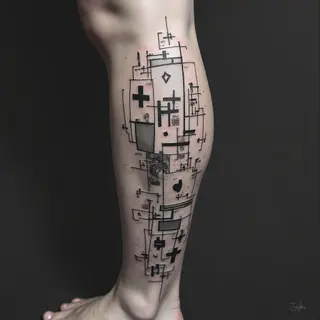 Fragmented Urban Leg Tattoos: A Collection of Street Art Motifs