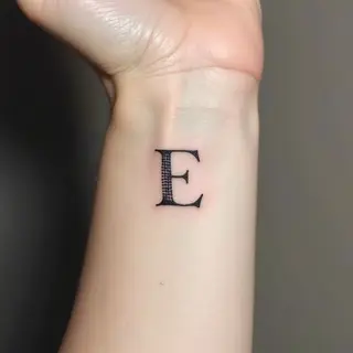 Small & Delicate Letter Tattoos for Women: Inspiration & Meaning