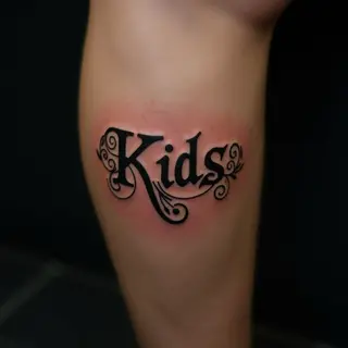 Small Ornamental Boys Name Tattoo Ideas for the Calf