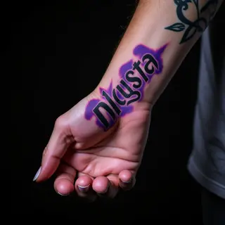 Men's Wrist Lettering Tattoos: Realistic Name Designs
