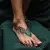 Film Characters with Dotwork Foot Tattoos: A Blue-Green Guide