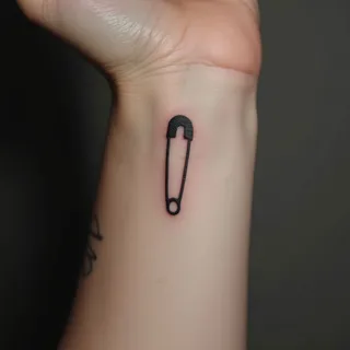 Small Safety Pin Tattoo: A Symbol of Mental Health Awareness